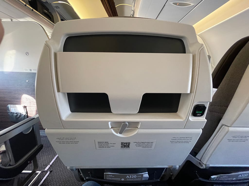 Etihad Airways A320 seatback without adjustable device holder