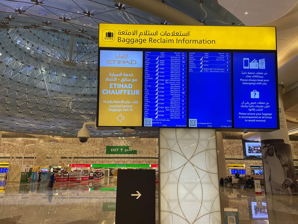 Signage for Etihad Chauffeur reception on arrival