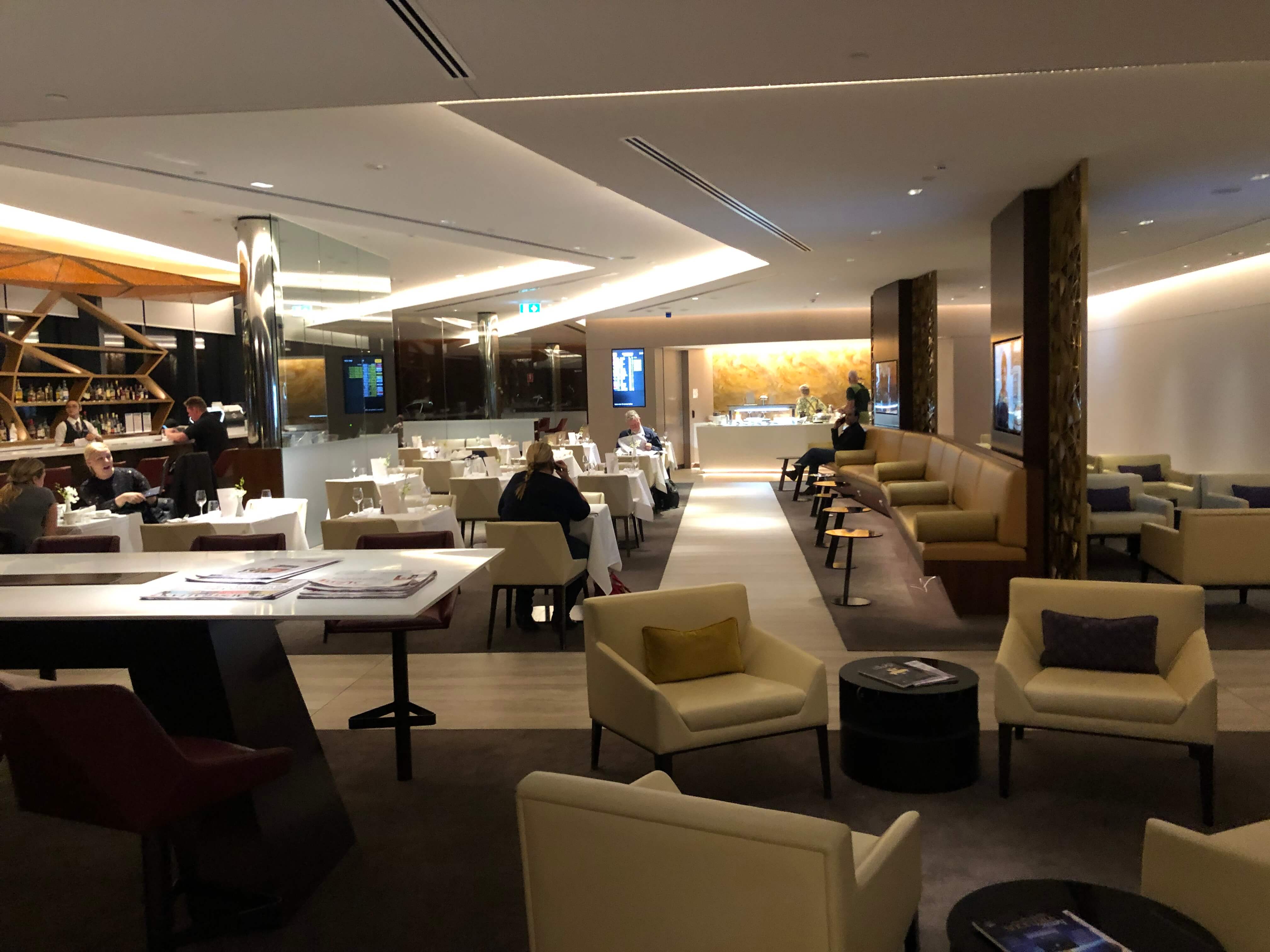 Seating at the centre of the lounge include dining tables and bar style seats