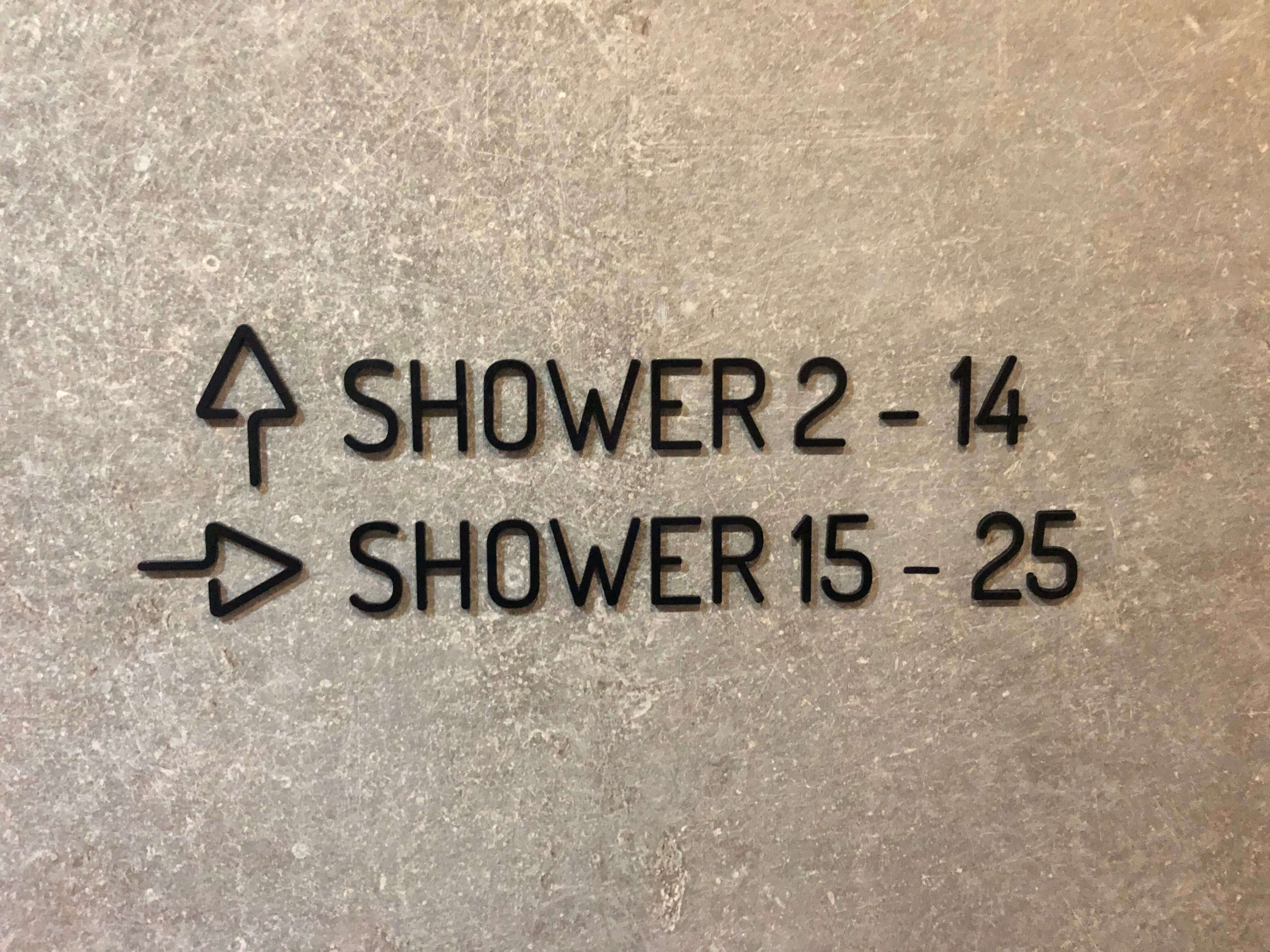 Shower signage Plaza Premium Arrivals Lounge London Heathrow Terminal 4